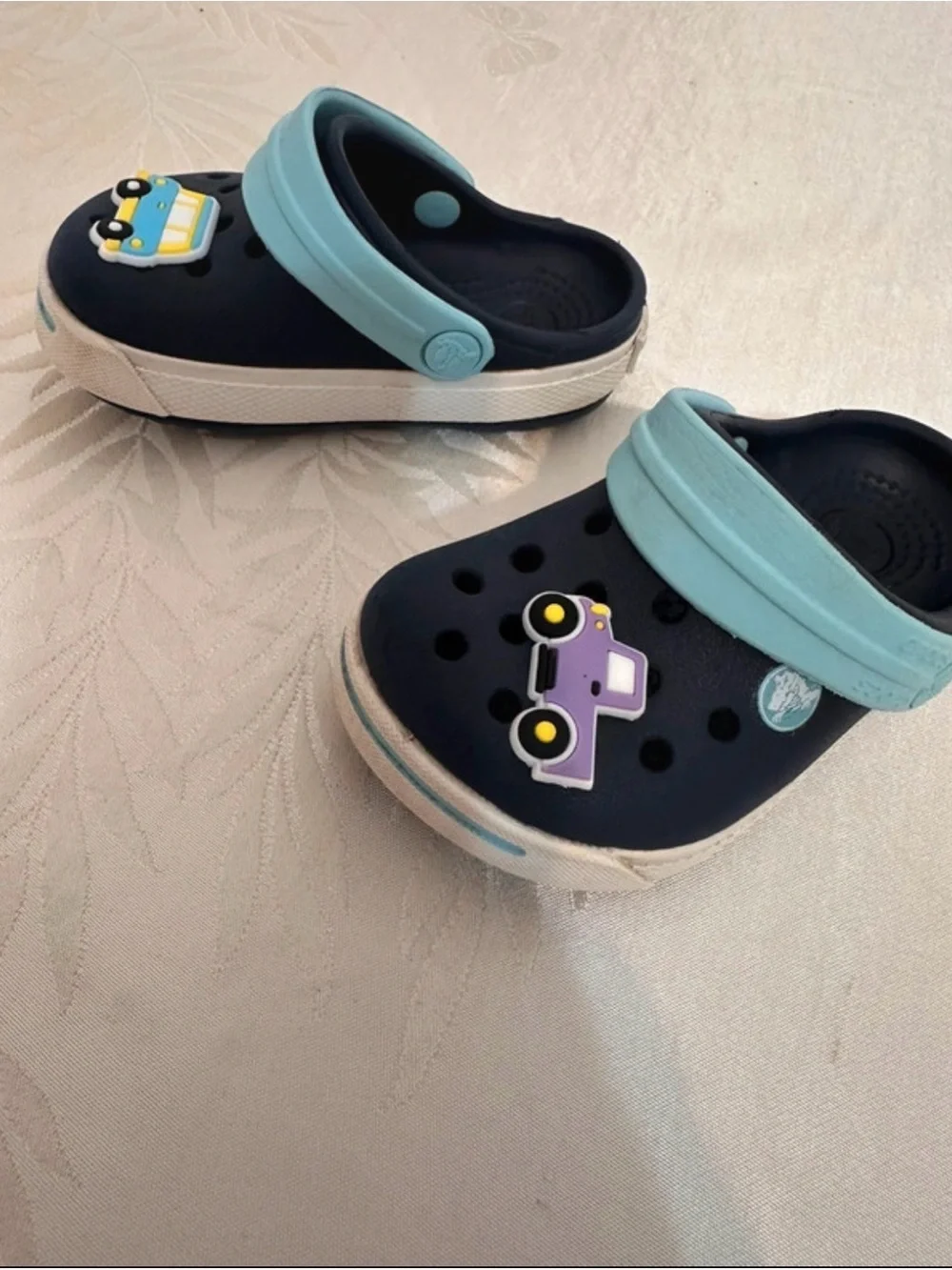 CROCS Navy Clogs with Light Blue Heel Straps and Car Charms